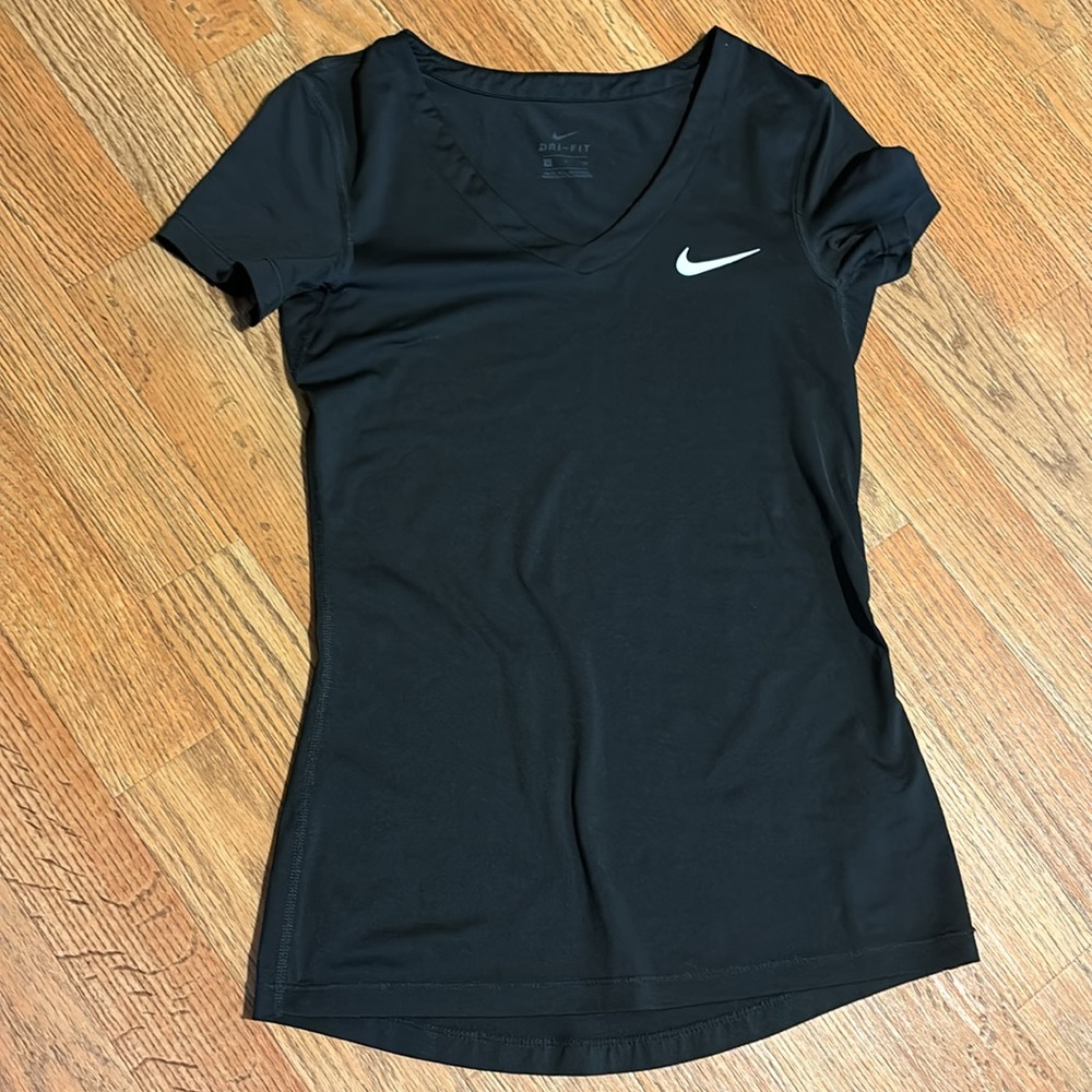 Nike Women’s dri-fit size small v-neck t shirt.